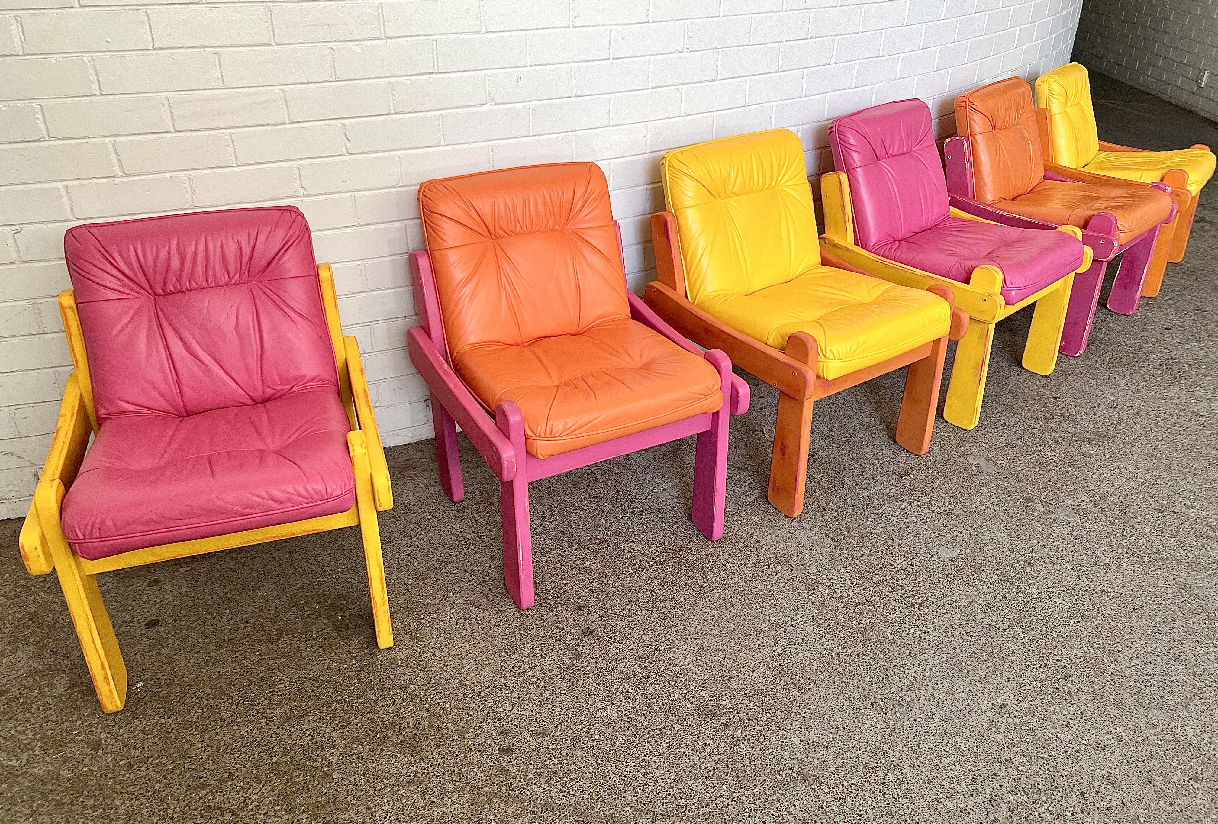 Sculptural chairs shown together after transformation in the studio.