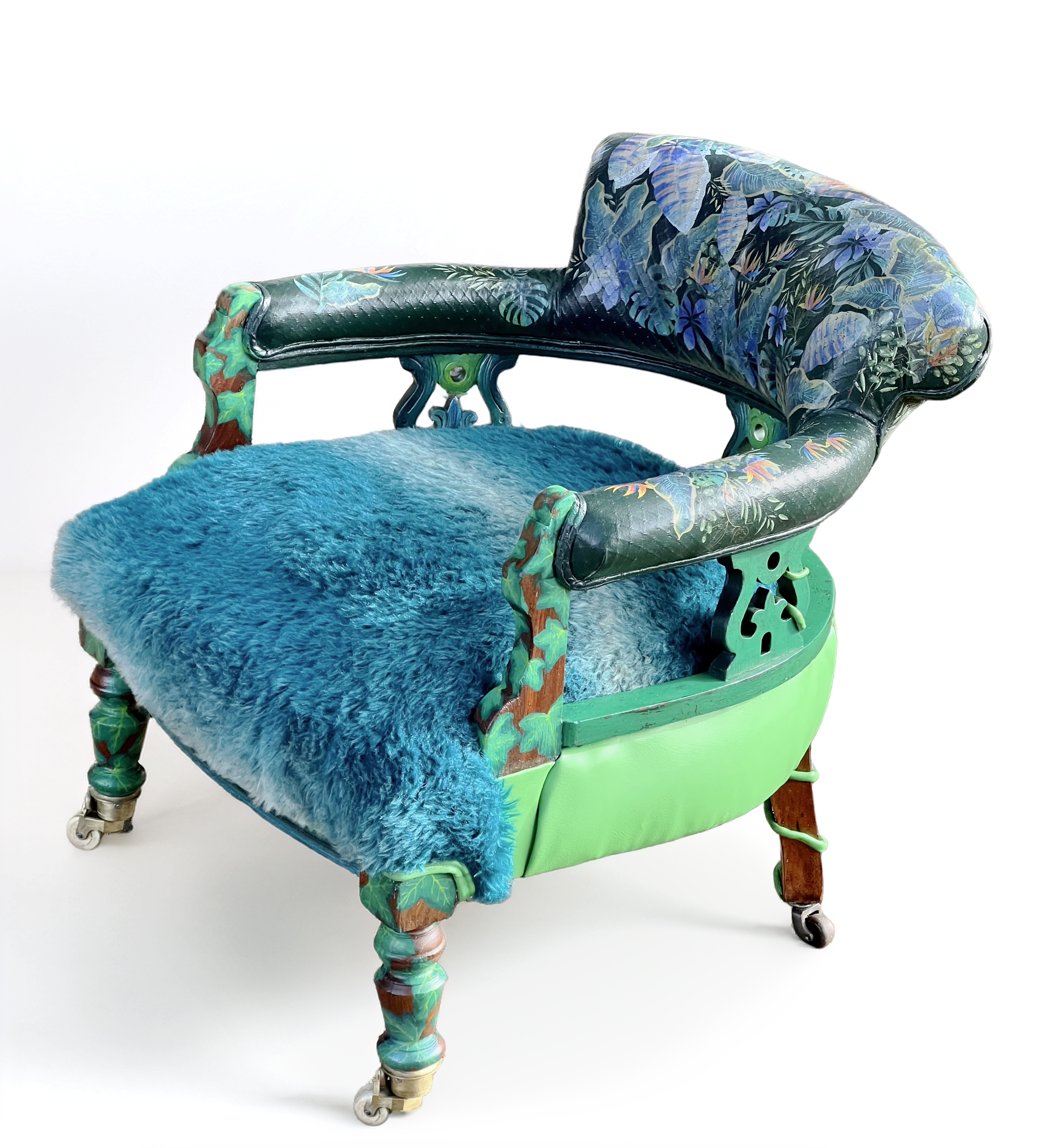 Two transformed sculptural chairs arranged with a table in a studio setting.